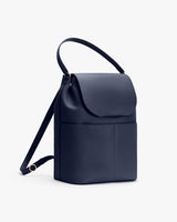Shoulder bag with flap closure and adjustable strap.