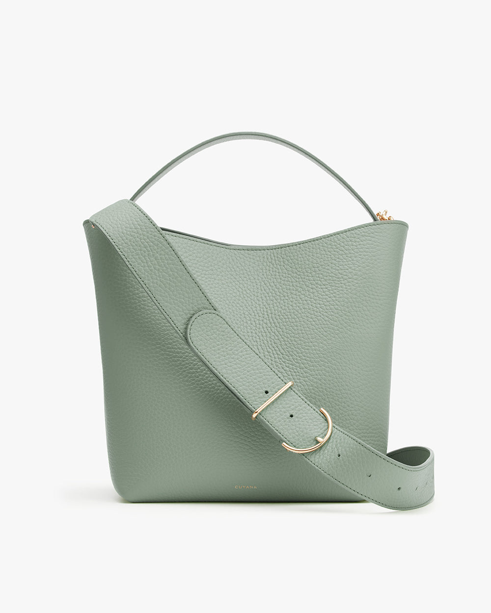 Handbag with a handle and an adjustable shoulder strap.