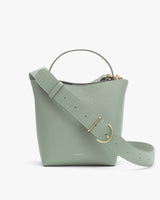 Handbag with a top handle and detachable shoulder strap