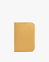 Leather wallet on a plain background.