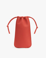 Drawstring pouch with tied cords at the top