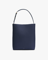 Tote bag with a single handle and a simple design.