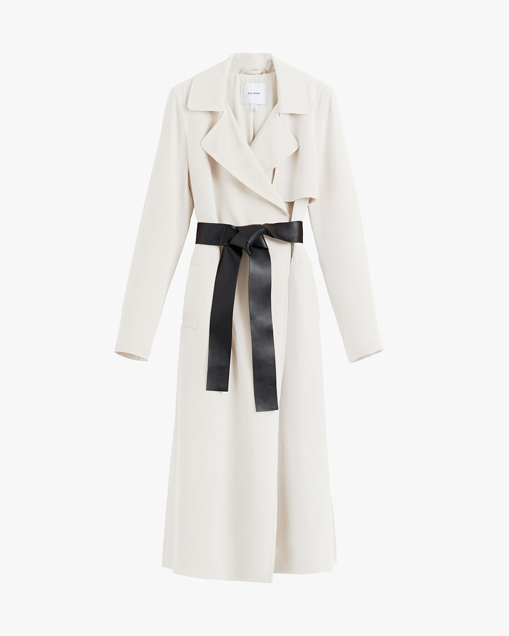 Trench coat with a wide belt tied in a bow.