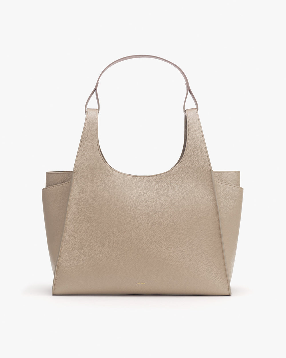 Handbag with two external pockets and a single handle.
