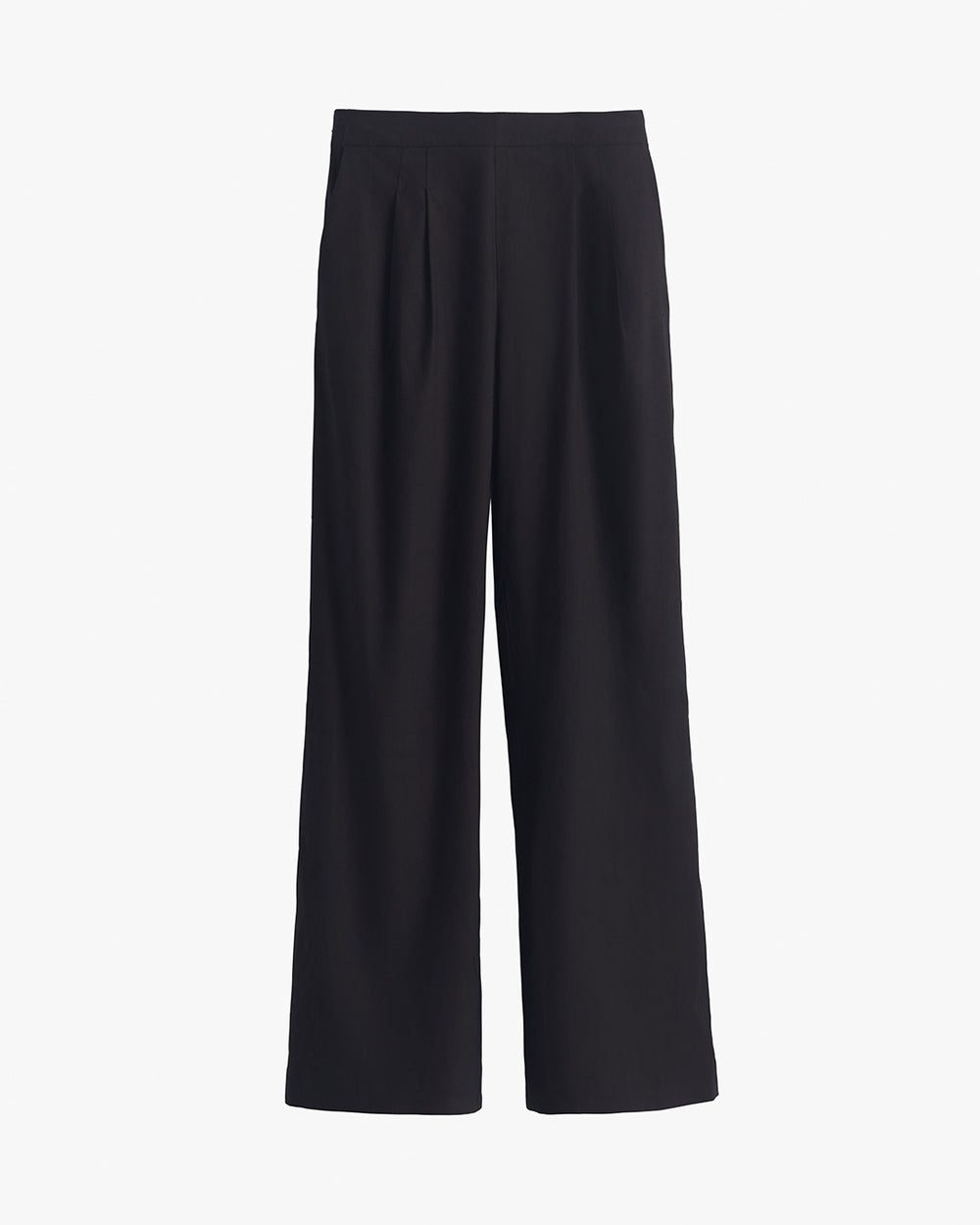 Linen Pleated Wide-Leg Pant Pair of wide leg pants hanging against a plain background