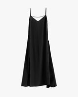 A sleeveless midi dress with straps and a unique asymmetrical hemline.