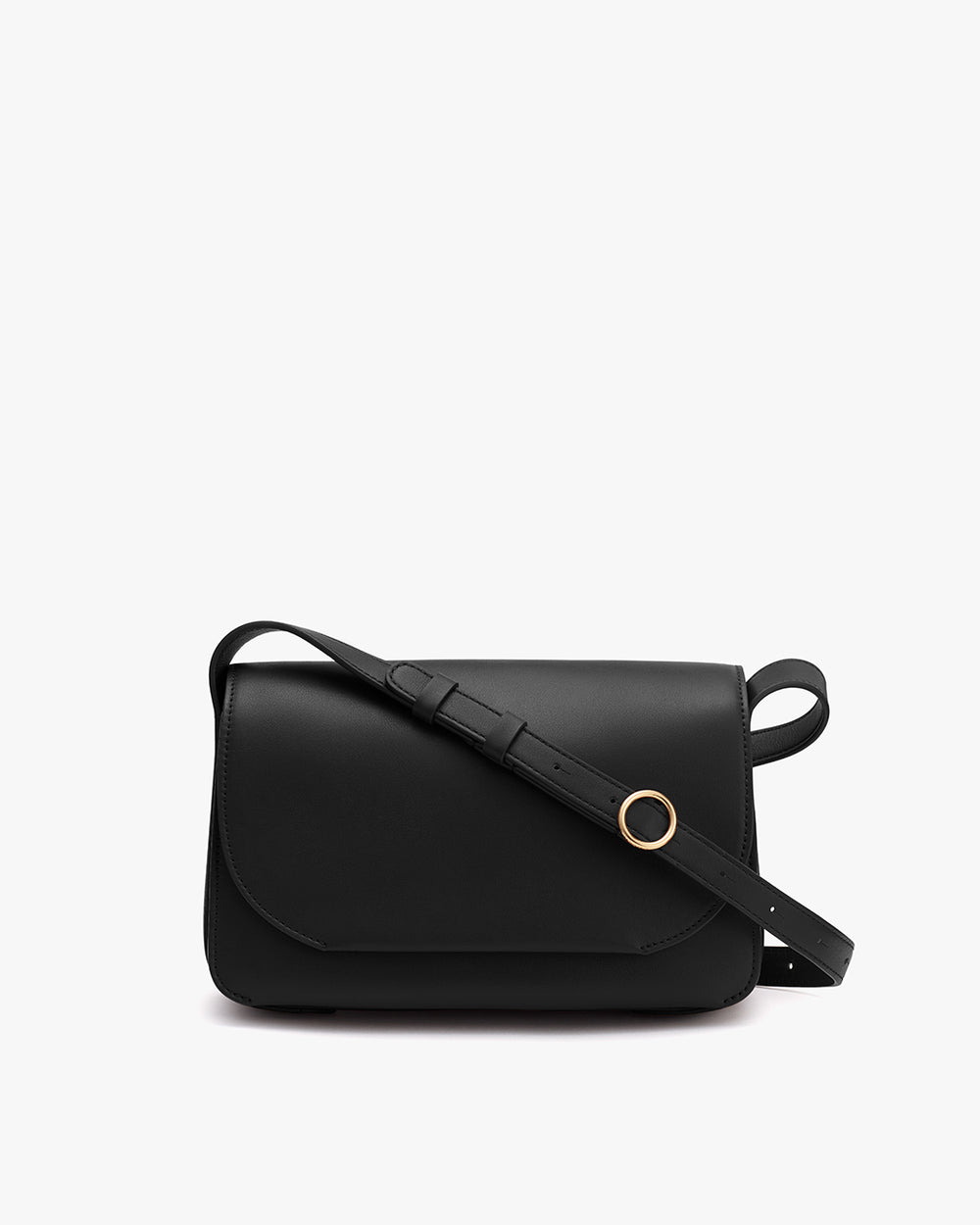 A shoulder bag with a flap and circular metal detail on strap.