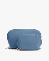 Two sizes of zippered pouches placed side by side.