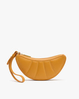 Semi-circle wristlet bag with zipper and wrist strap.
