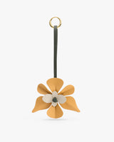 Flower-shaped keychain with ring attachment.