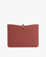 Rectangular leather pouch with a button closure at the top center.