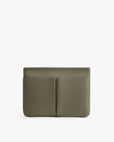 Rectangular leather clutch with a minimalist design and a front pocket.