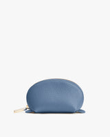 Small semicircular zippered pouch on white background