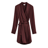 Women's wrap style robe with a belt and long sleeves.