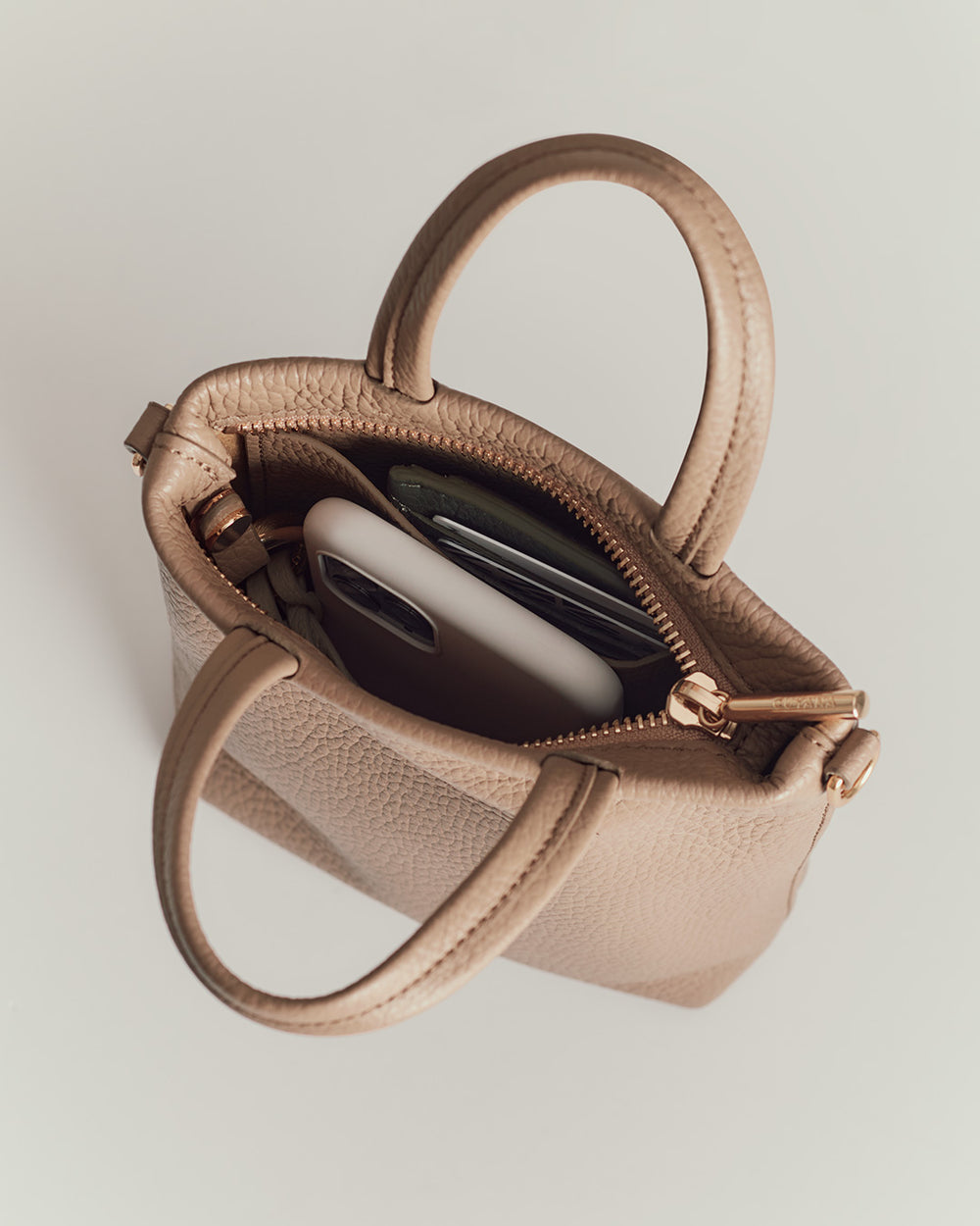 Handbag with a cellphone and wallet inside