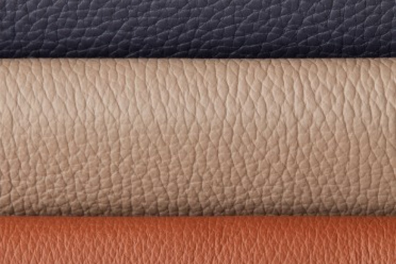 Three layers of textured fabric stacked horizontally.
