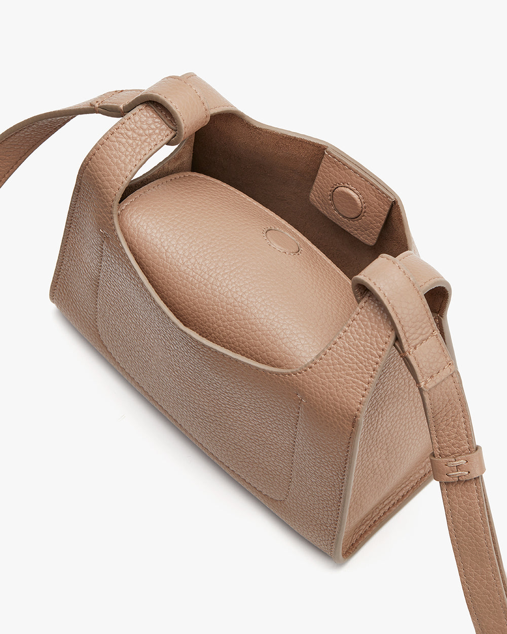Open handbag with interior visible and strap attached.
