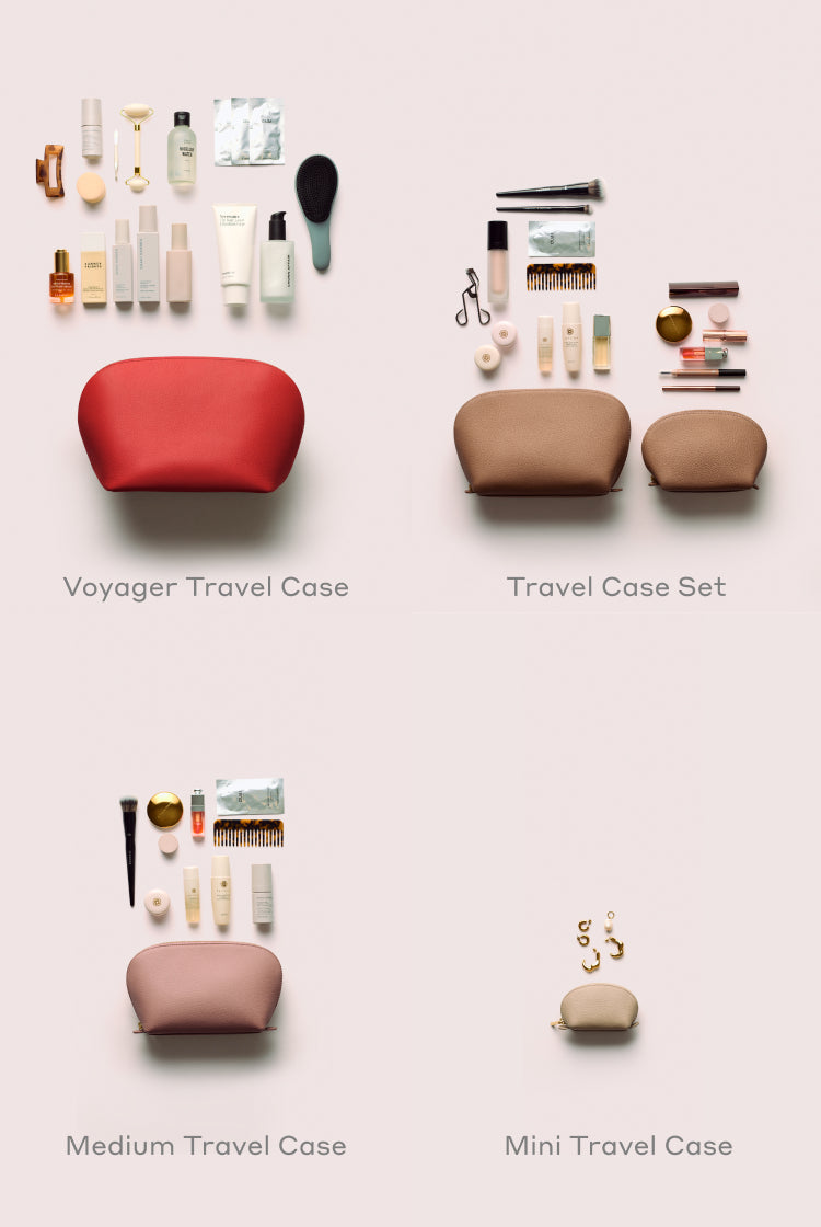 Four travel cases with various toiletries and accessories displayed above each case.