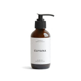 Pump bottle labeled as all-natural leather conditioner on a plain background.