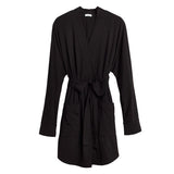 Bathrobe with tie belt and pockets on white background.