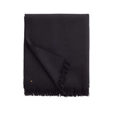 Folded scarf with fringe on one edge