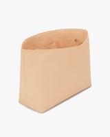 Open-top handbag with a smooth finish, standing upright.