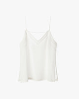 Sleeveless top with spaghetti straps and a V-neckline.