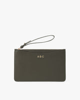Wristlet with a wrist strap and personalized initials 'ABC' on the front.