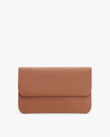 Fold-over clutch bag against a plain background.