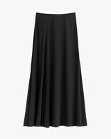 Long pleated skirt on plain background.