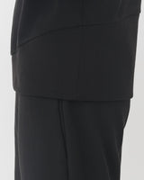 Close-up of a person wearing formal attire.