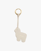 Keychain shaped like an alpaca with a ring and strap.