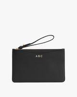 Wristlet with a monogrammed initial ABC on the front.