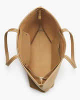 Top view of an open, empty handbag