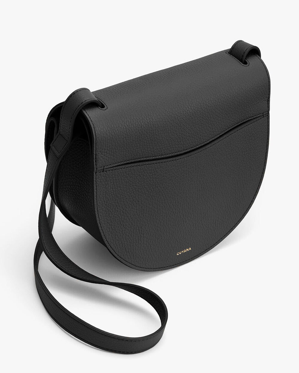 Shoulder bag with a curved flap and a long strap.