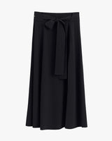 Long skirt with a bow tie at the waist.