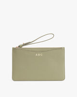 Wristlet with wrist strap and monogram ABC on front