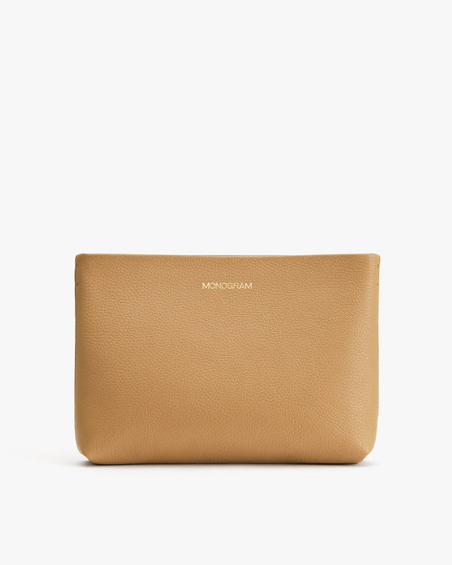 Leather pouch with embossed brand name