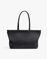 Large tote bag with two handles and a brand logo at the bottom front.