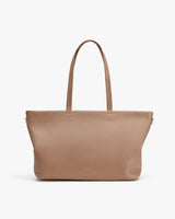 Large tote bag with two handles against a plain background.