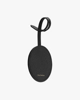Oval-shaped tag with a loop and branded text.
