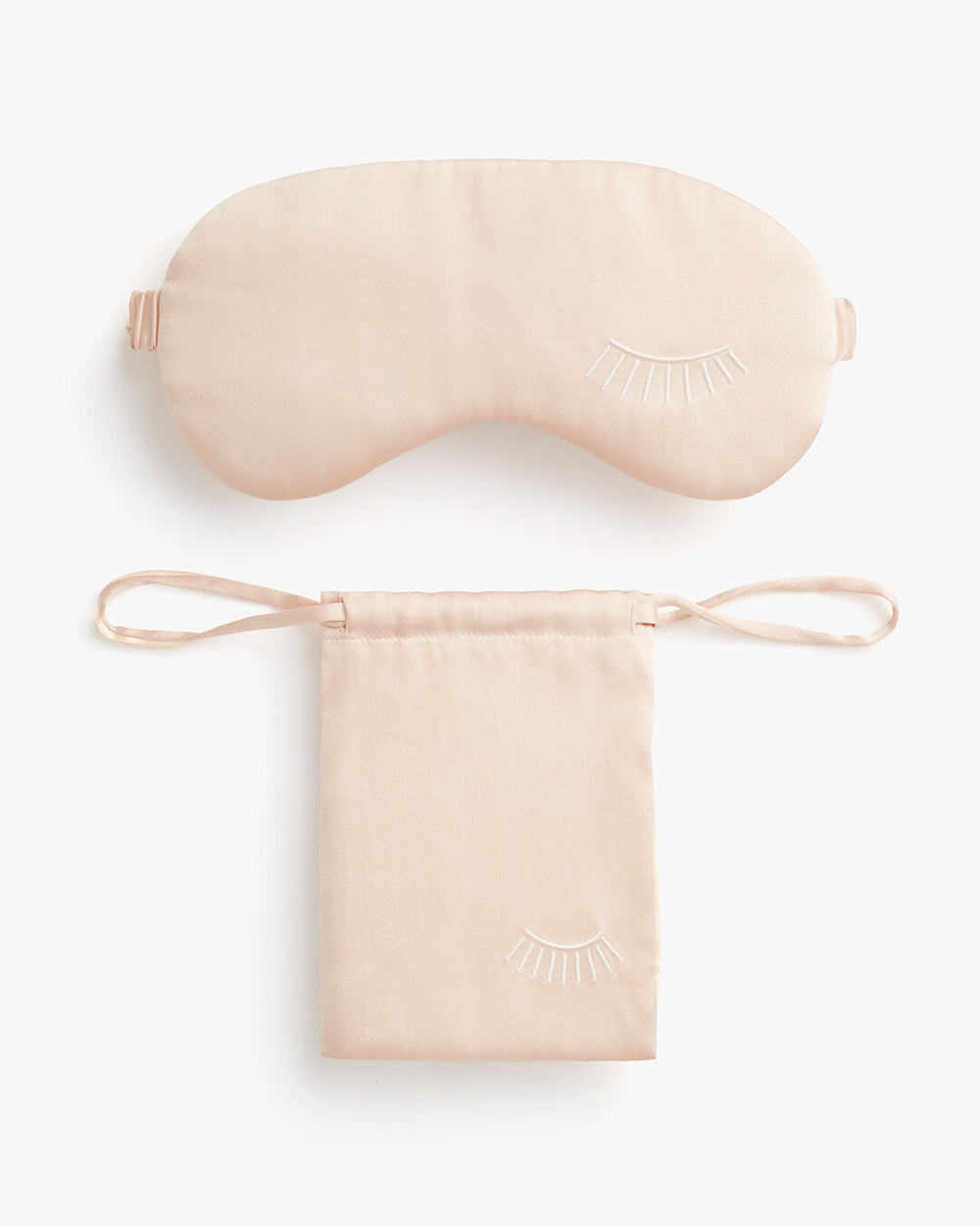 Sleep mask with lash design and matching storage pouch.