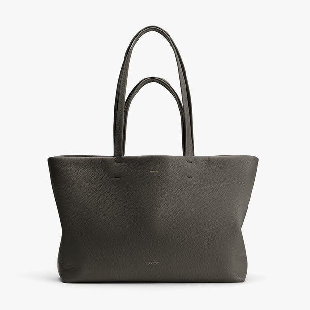 Large tote bag with two handles, standing upright.