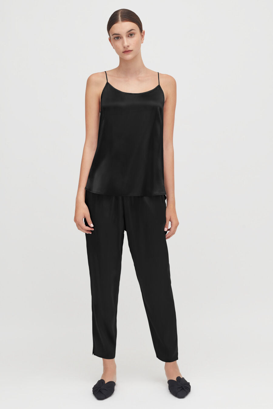 Washable Charmeuse Tapered Pant Woman standing in a sleeveless top and pants outfit, facing forward.