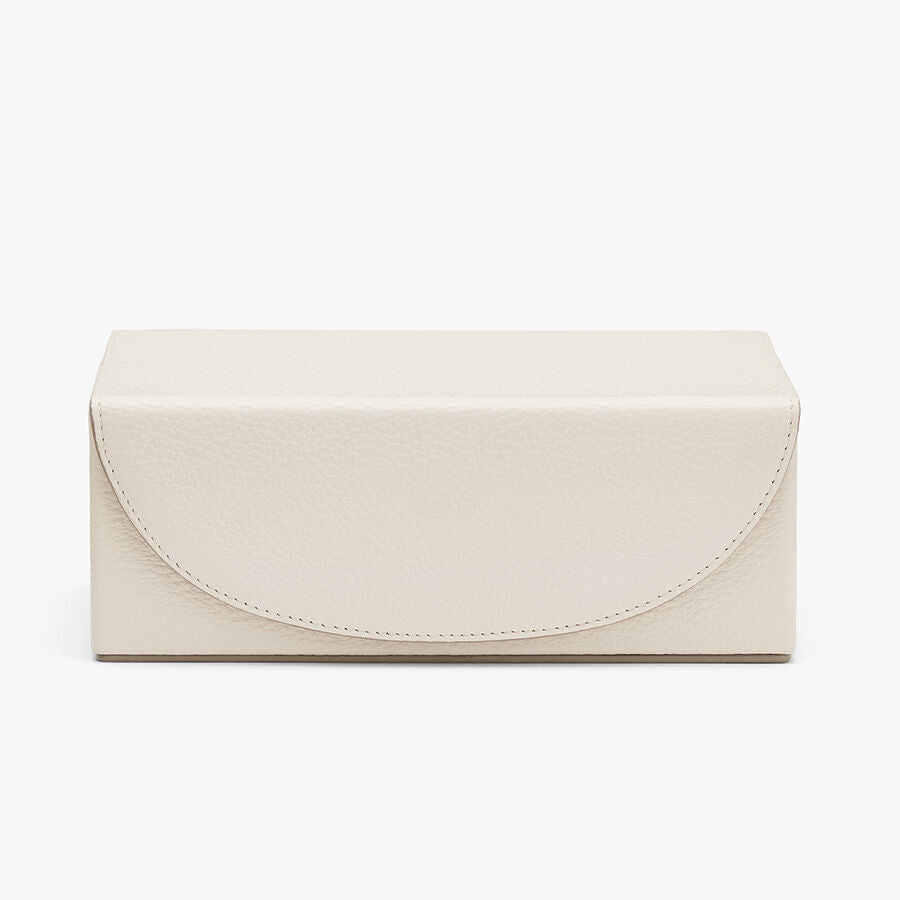 Rectangular clutch with flap closure and visible stitching.