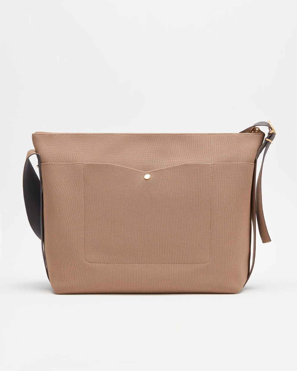 Oversized Sling Bag Closed shoulder bag with a front flap and shoulder strap.