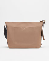 Closed shoulder bag with a front flap and shoulder strap.