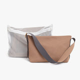 Two different styled handbags with shoulder straps.
