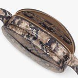 Open textured clutch bag with a zipper closure.