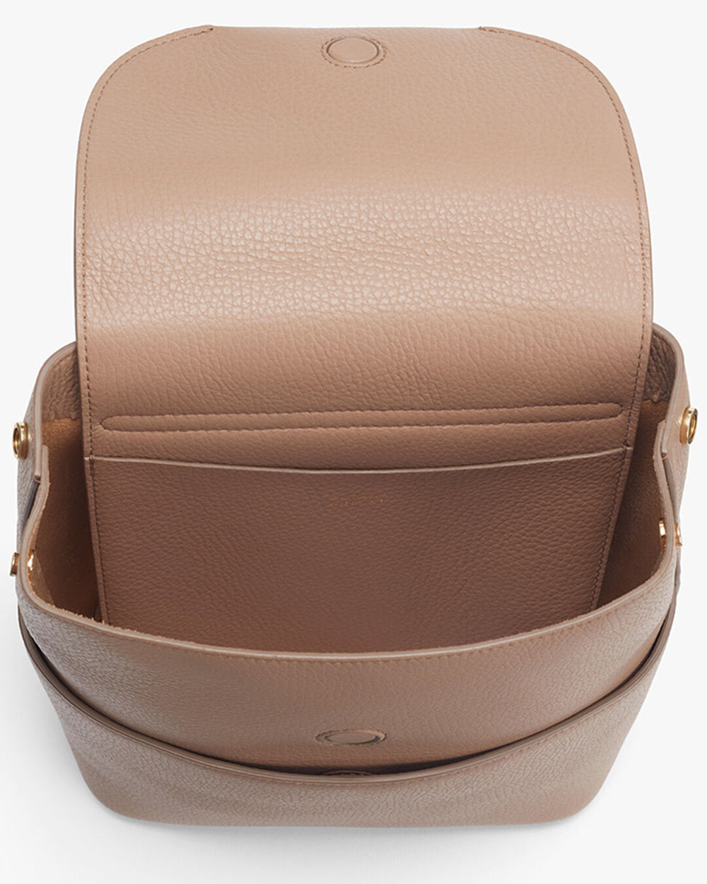 Textured shoulder bag with flap closure and adjustable strap.
